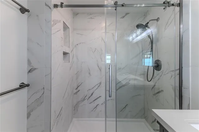 a view of a chairs and table on the deck