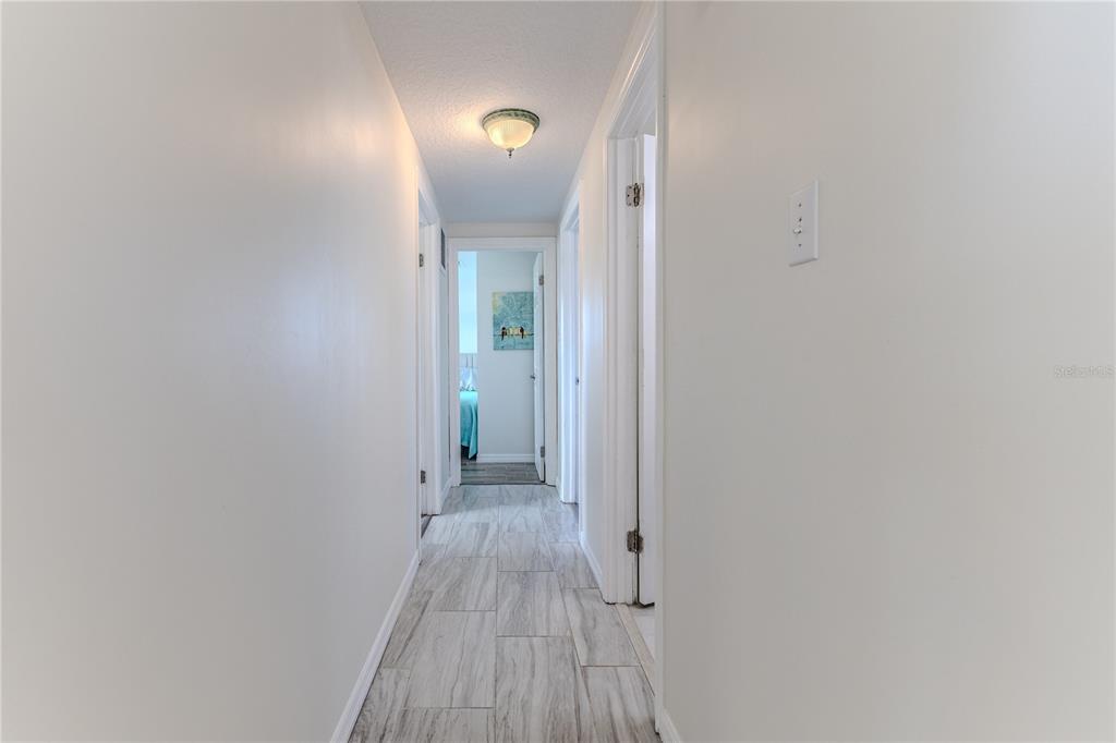 3409 Gulf Winds Circle Hernando Beach, FL 34607 - Photo 47 of 84 a view of a room with wooden floor