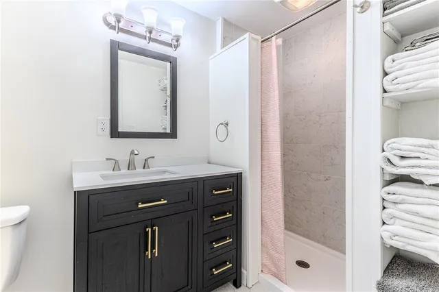 an aerial view of a house swimming pool patio and outdoor seating