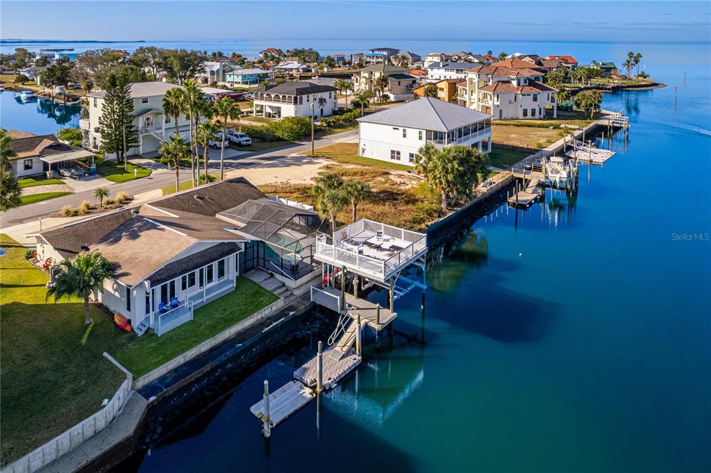 3409 Gulf Winds Circle Hernando Beach, FL 34607 - Photo 81 of 84 an aerial view of a house swimming pool patio and outdoor seating