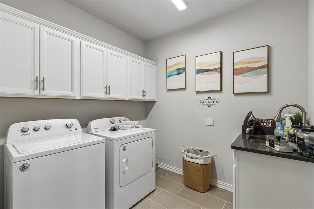 651 Watters Road, Unit 7204 Allen, TX 75013 - Photo 30 of 40 a utility room with sink dryer and washer