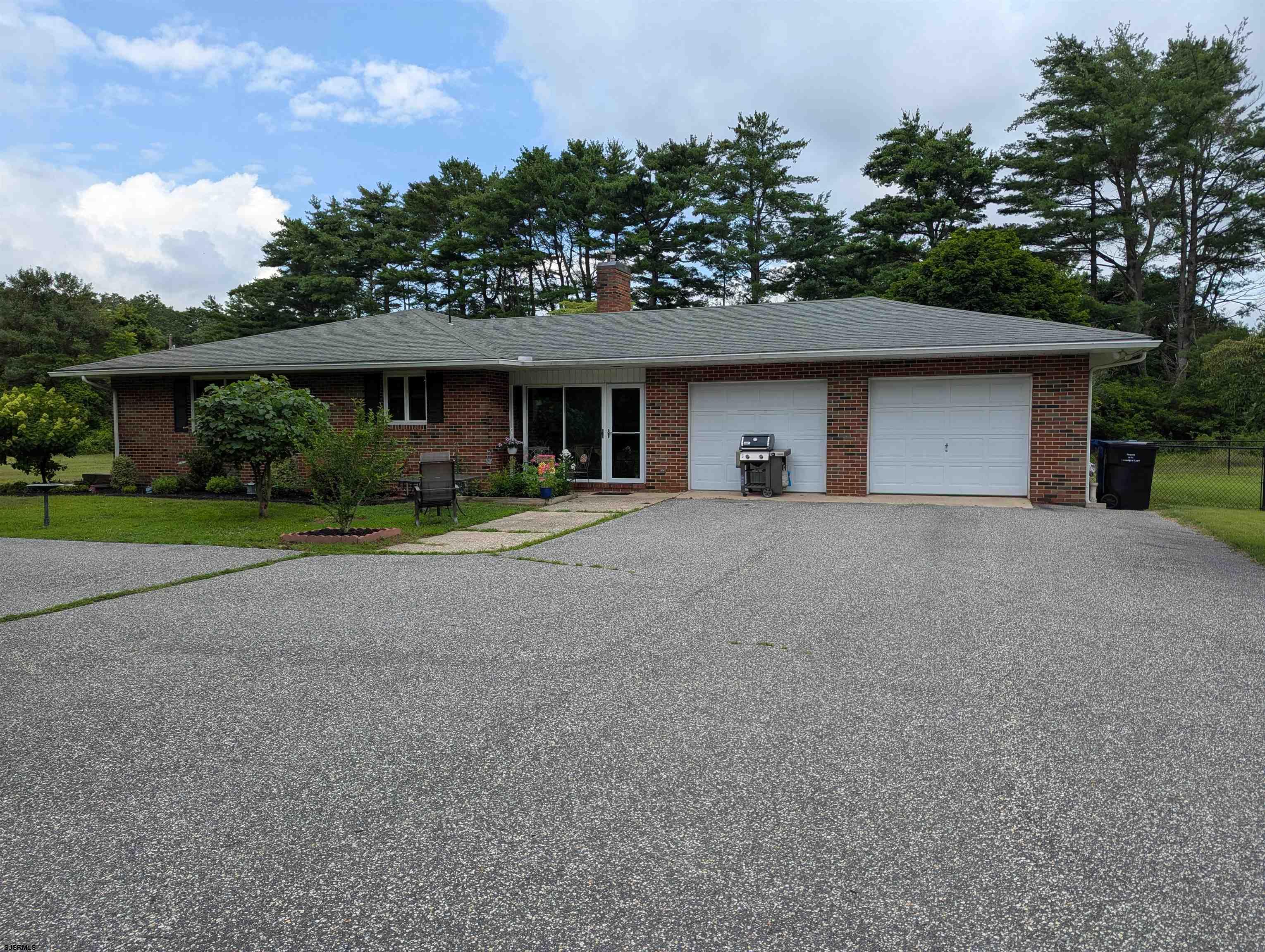 71 Perry Road Woodbine, NJ 08270 - Photo 1 of 32 a front view of a house with garden