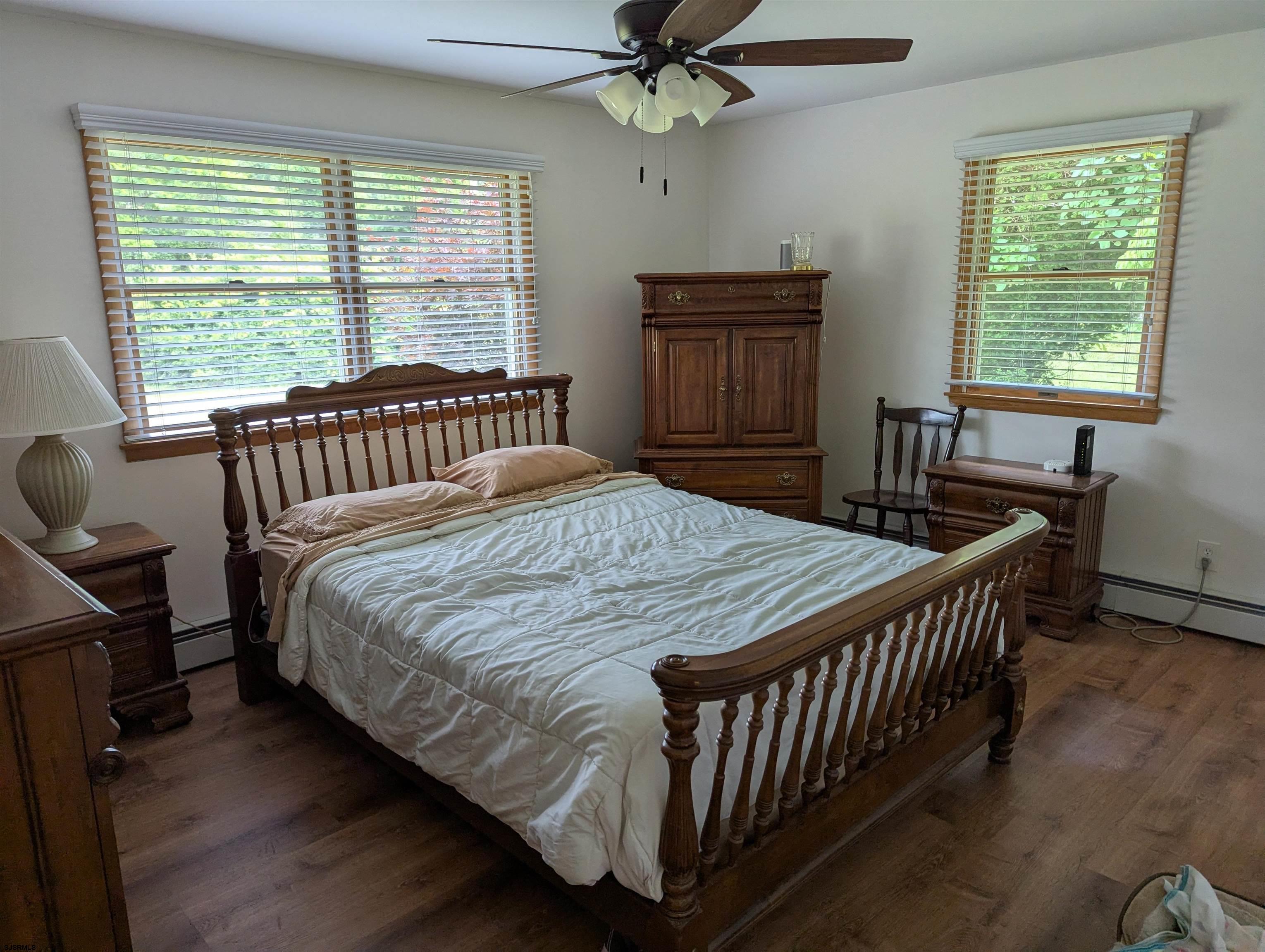 71 Perry Road Woodbine, NJ 08270 - Photo 13 of 32 a bedroom with a bed and a window