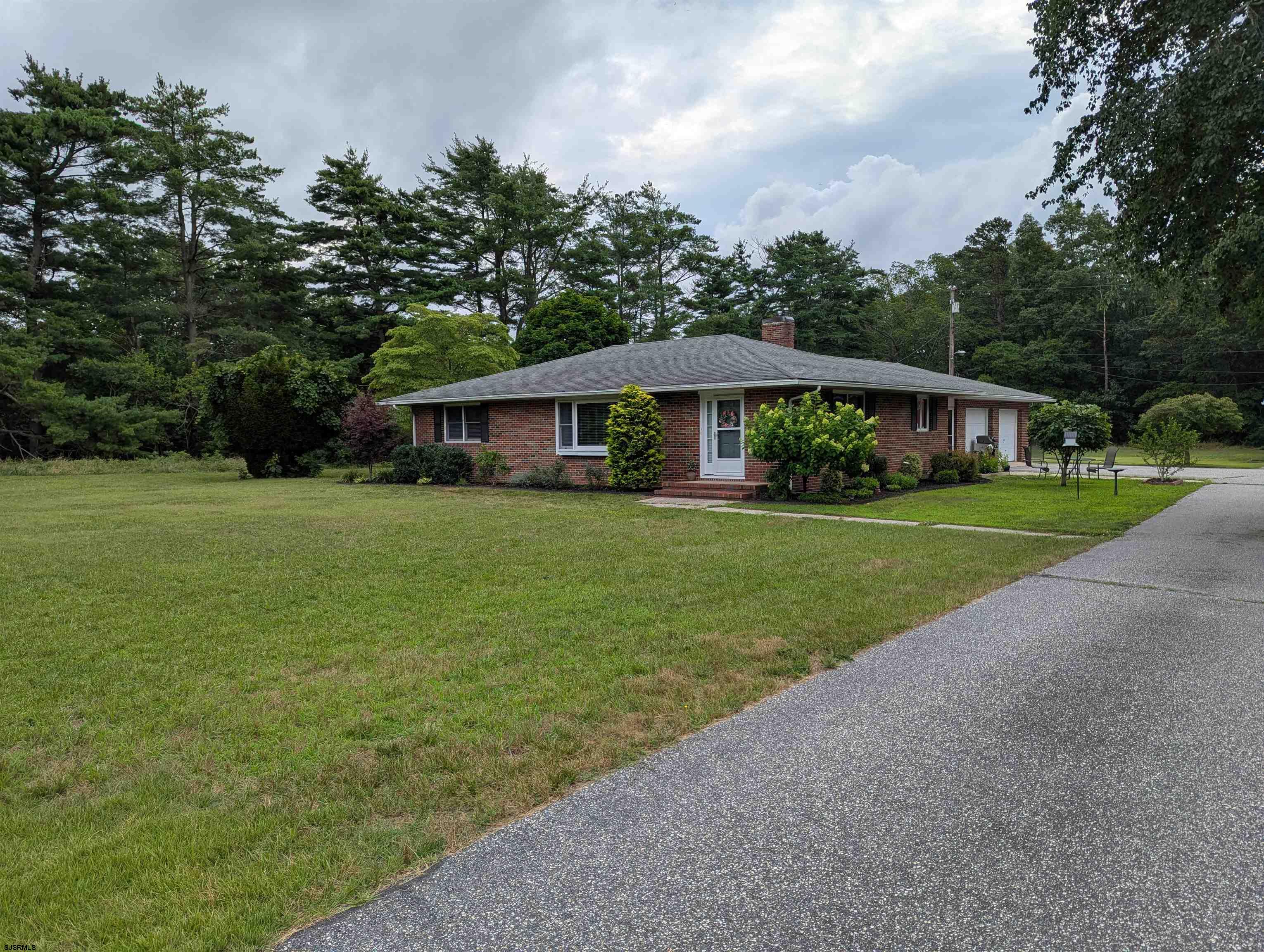 71 Perry Road Woodbine, NJ 08270 - Photo 2 of 32 a view of a house with a big yard