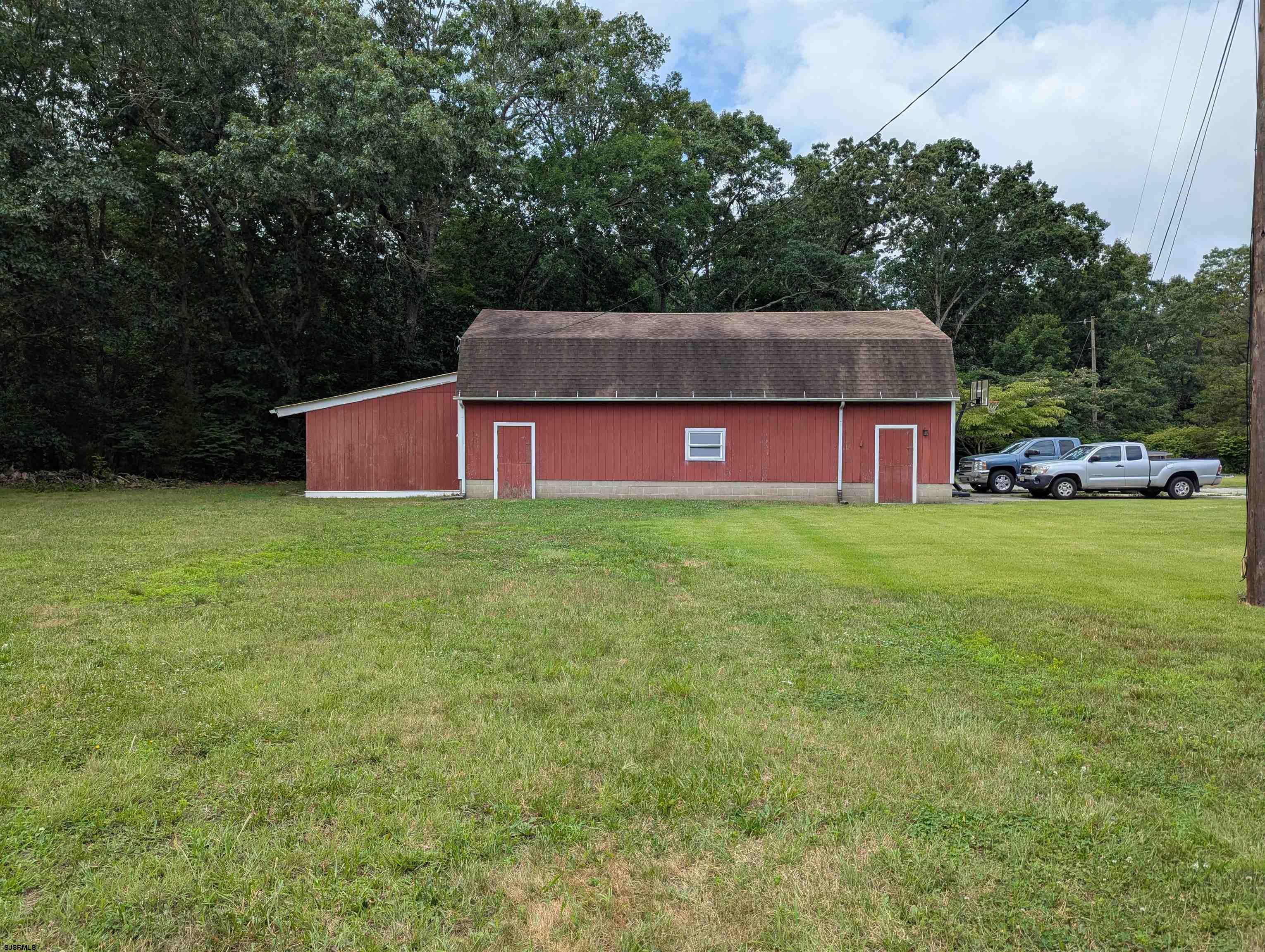 71 Perry Road Woodbine, NJ 08270 - Photo 25 of 32 a view of a house with a yard