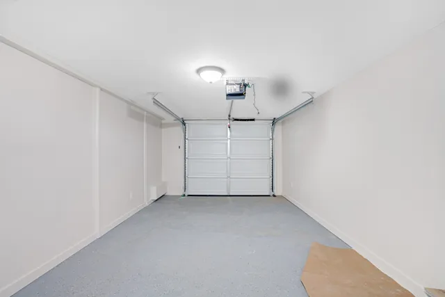 a view of a house with yard and a tree