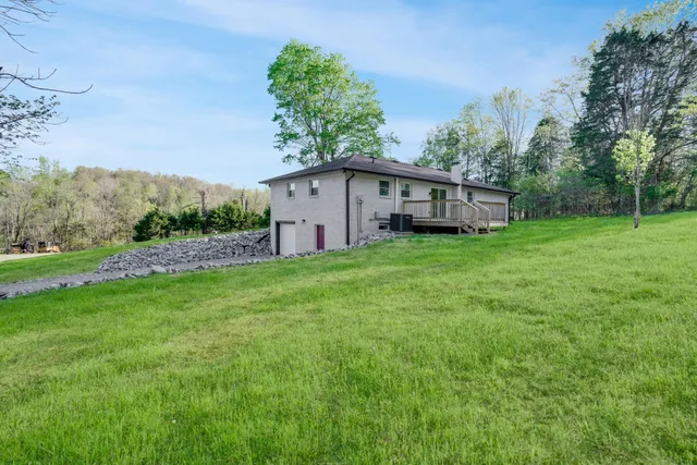 a view of a house with a big yard