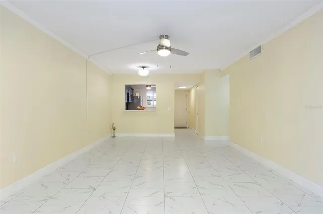 a view of livingroom with furniture and floor to ceiling window