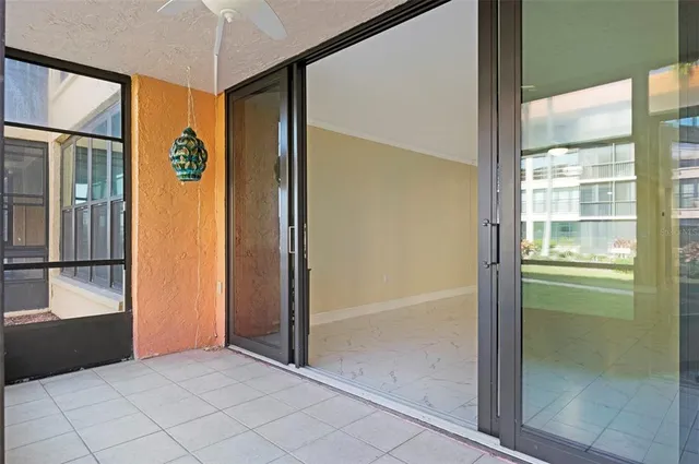 a bathroom with a shower and a sink