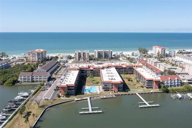 a view of a swimming pool with a sitting area