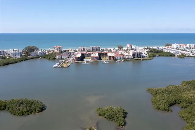 a view of a swimming pool with a lounge chair