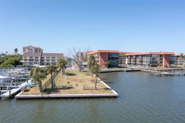 a view of a lake with sitting area