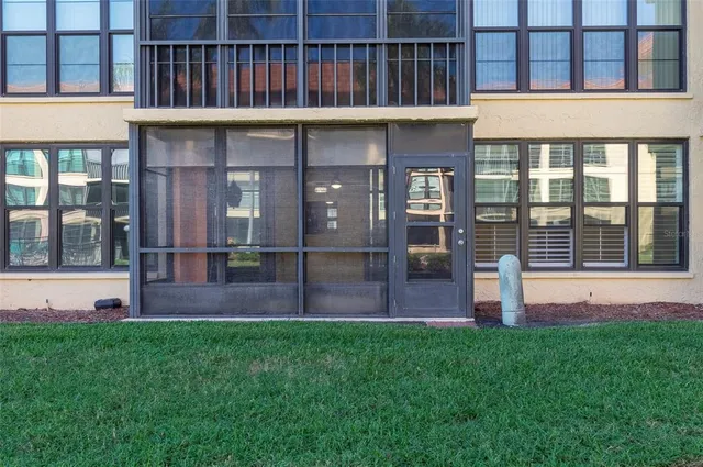 a view of balcony with wooden floor and fence