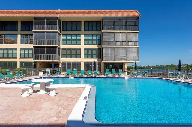 a view of balcony with furniture