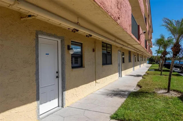 a kitchen with a sink a stove and refrigerator