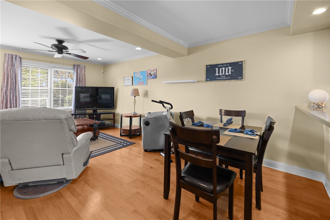 209 Calhoun Street, Unit 201 Clemson, SC 29631 - Photo 10 of 35 This inviting space features hardwood floors and ample natural light, perfect for everyday living.