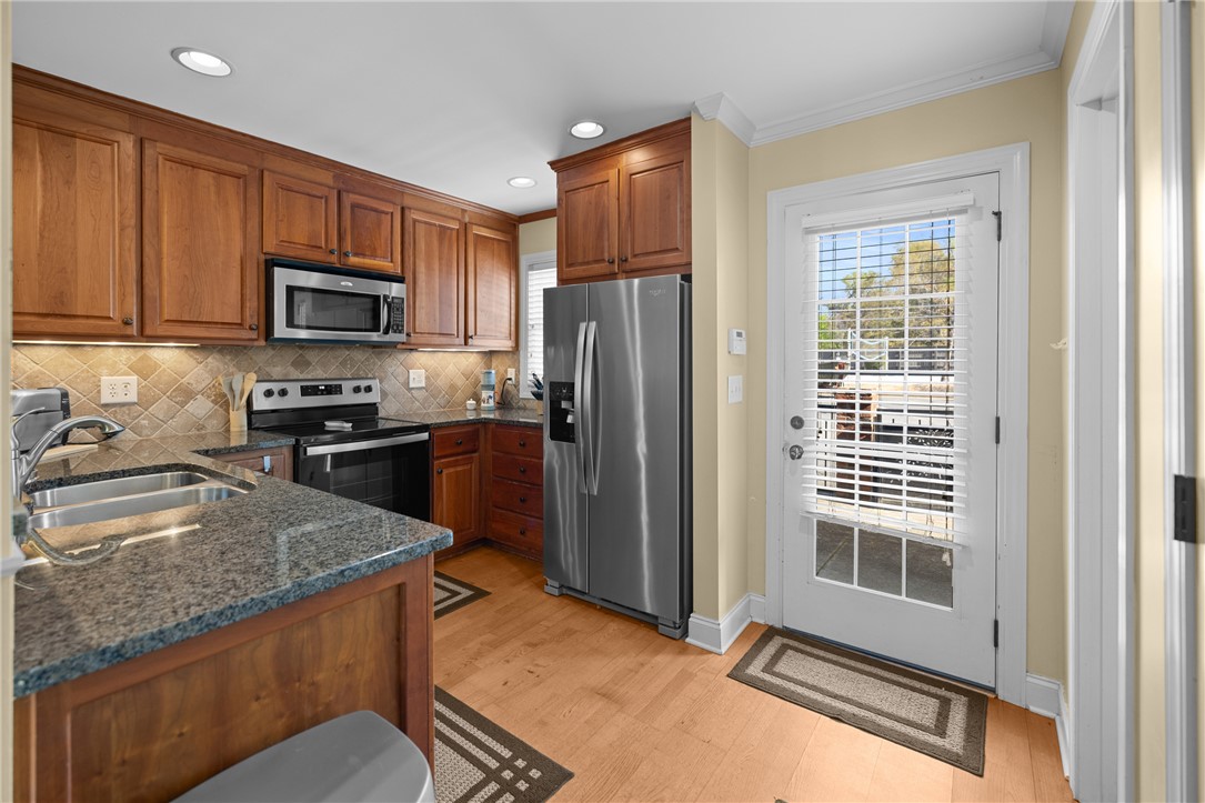 209 Calhoun Street, Unit 201 Clemson, SC 29631 - Photo 11 of 35 This culinary space boasts a functional layout, ideal for everyday living and entertaining.