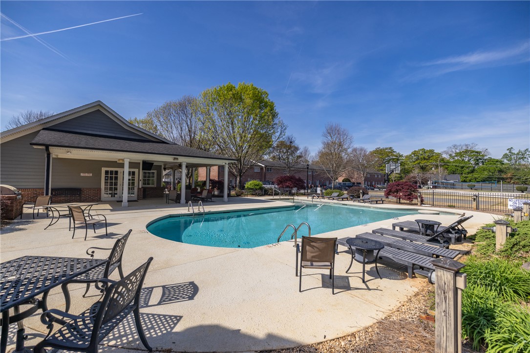 209 Calhoun Street, Unit 201 Clemson, SC 29631 - Photo 34 of 35 Relax poolside at this tranquil community oasis with ample space for lounging and recreation.