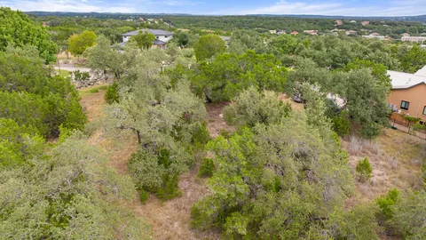 a view of a yard with an outdoor space