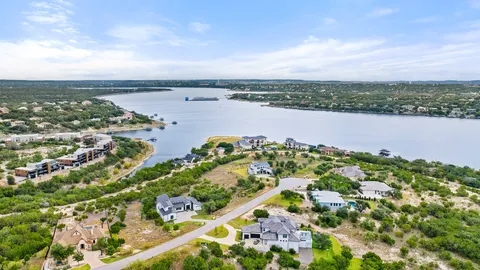 a view of a lake with a city