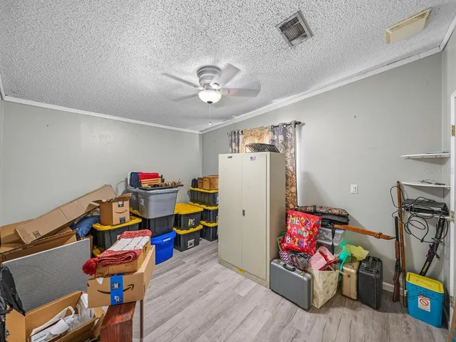 a bathroom with a sink double vanity granite tub and a mirror