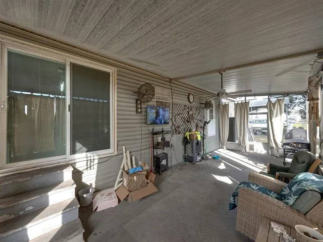 a view of a car park in front of house