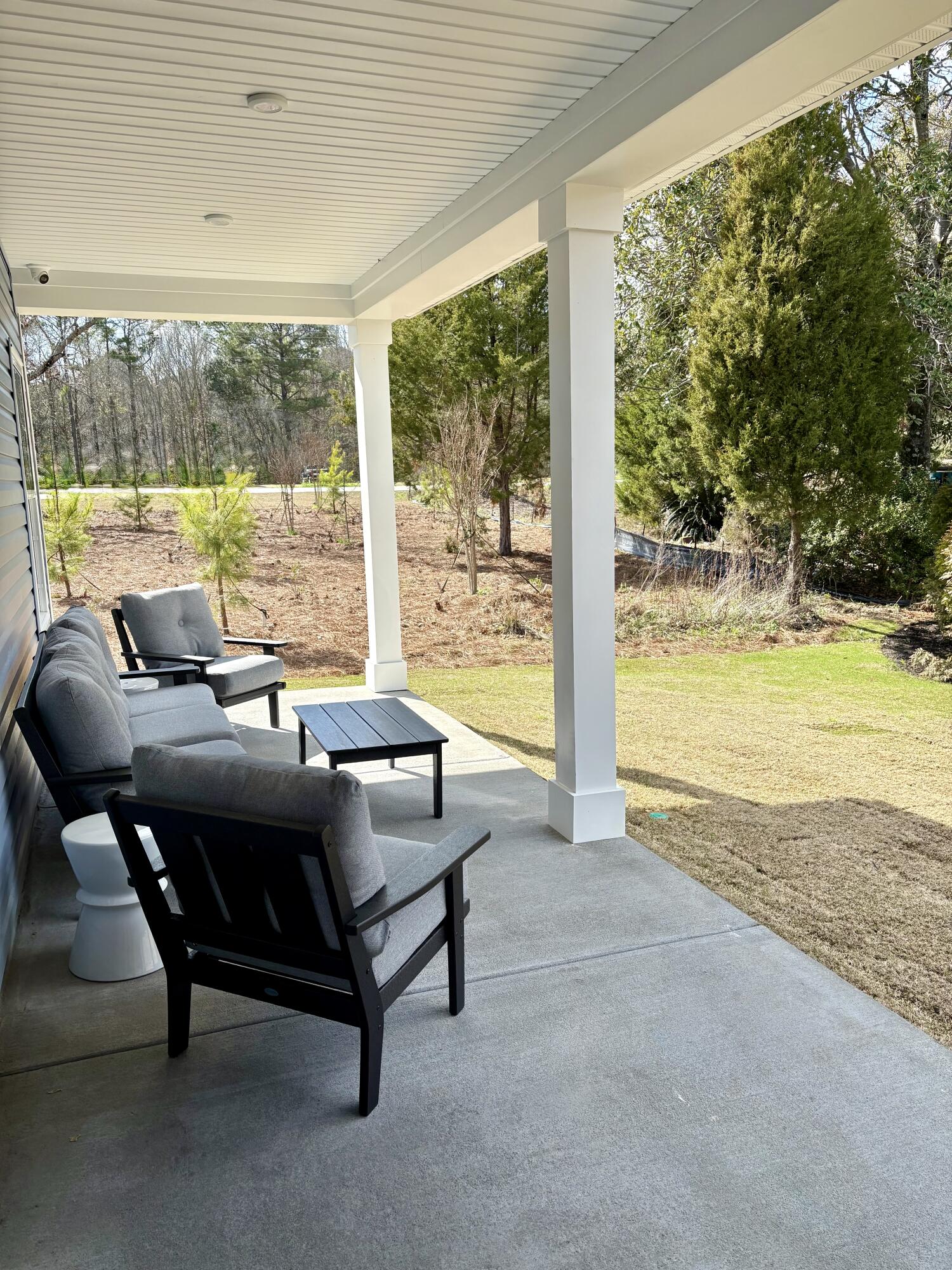 104 Cainwalker Drive Huger, SC 29450 - Photo 17 of 21 Rear Porch