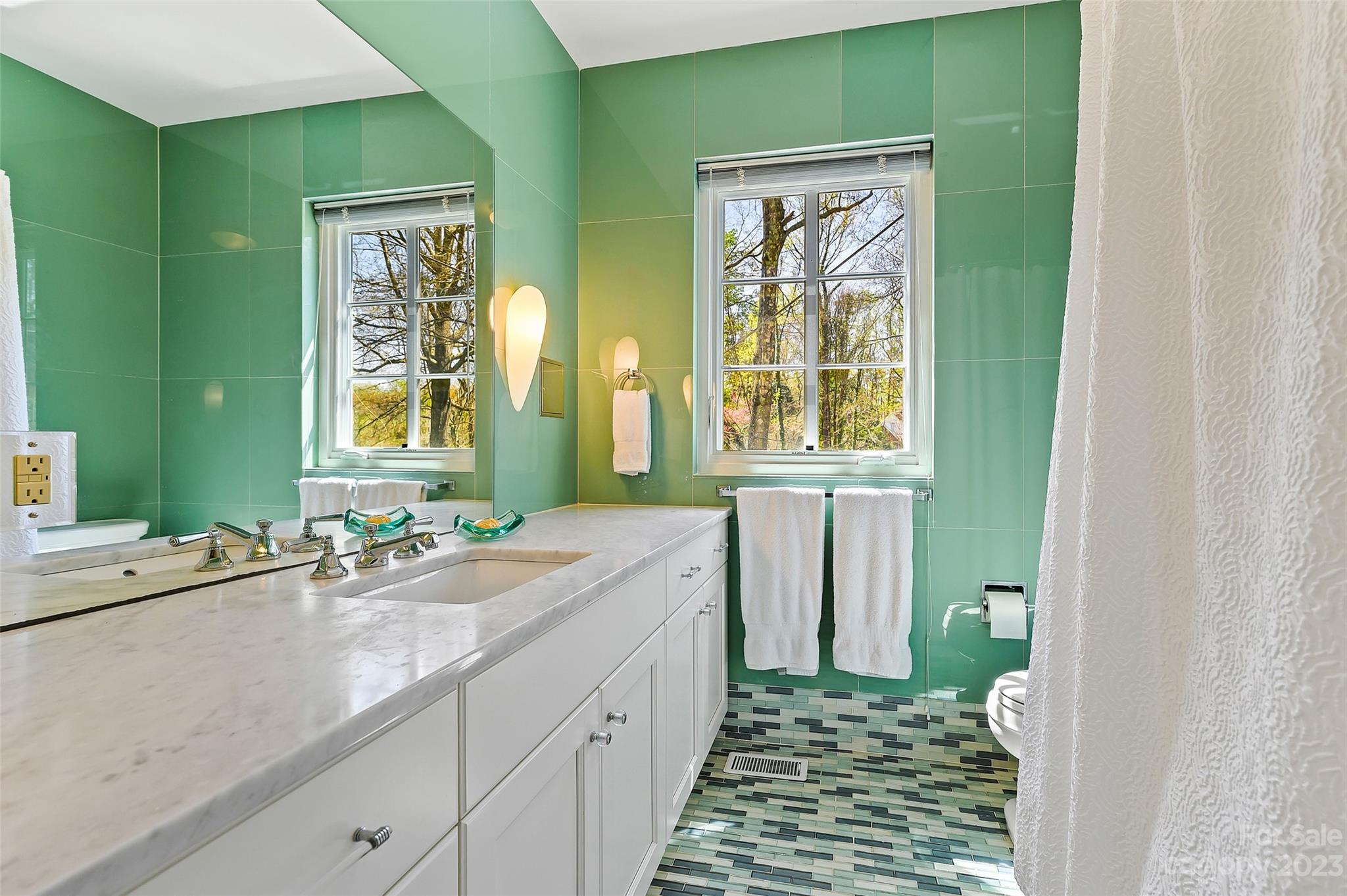 246 Shasta Lane Charlotte, NC 28211 - Photo 22 of 48 a bathroom with a granite countertop sink a toilet and a mirror
