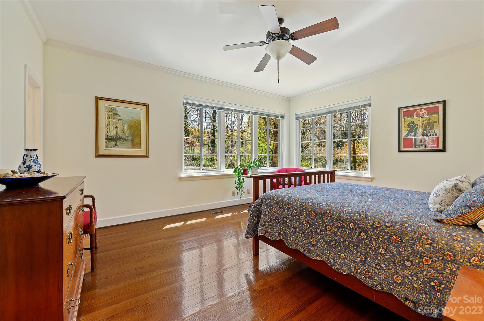 246 Shasta Lane Charlotte, NC 28211 - Photo 23 of 48 a bedroom with a bed and wooden floor