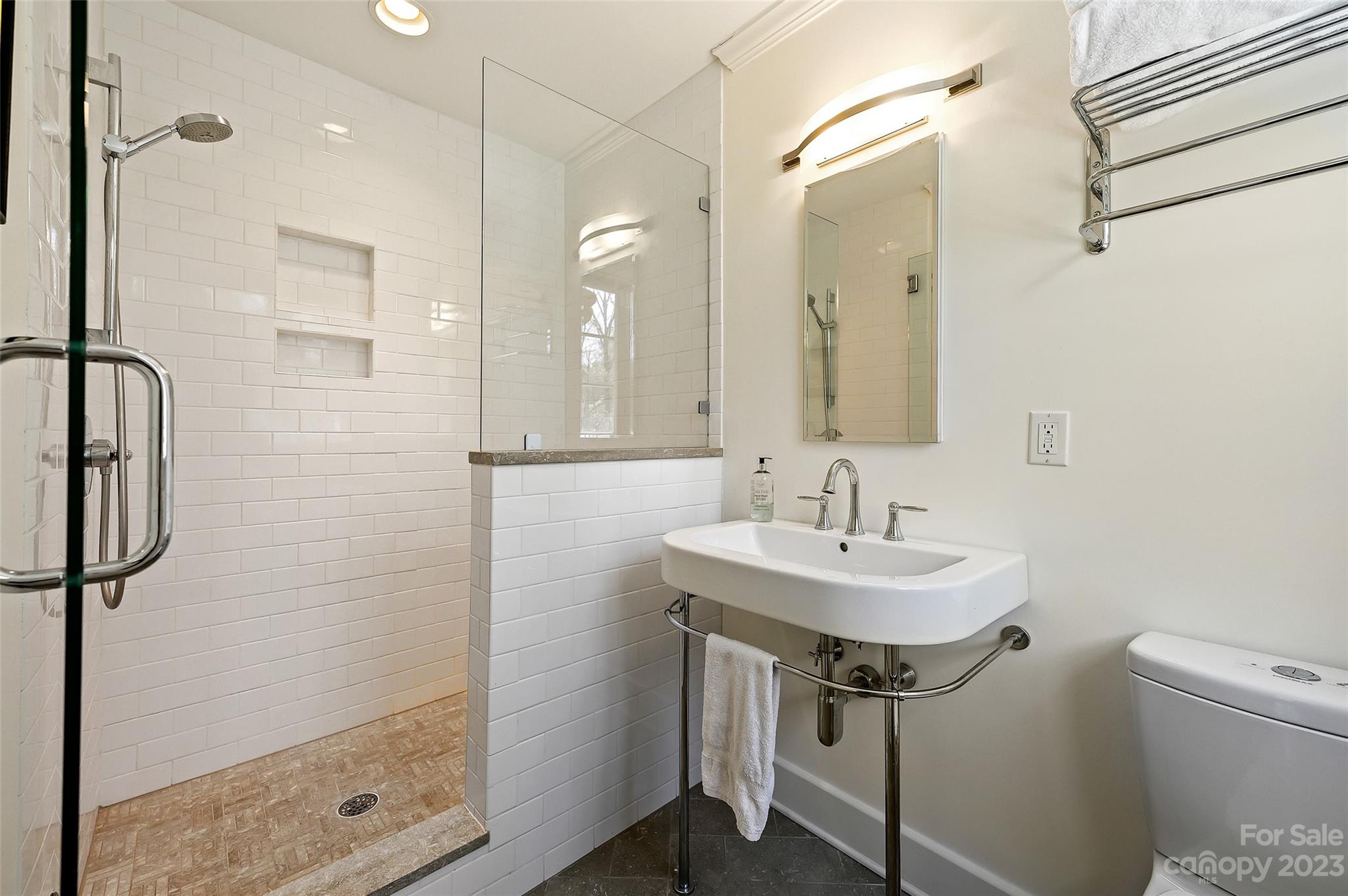 246 Shasta Lane Charlotte, NC 28211 - Photo 24 of 48 a bathroom with a sink shower and a mirror