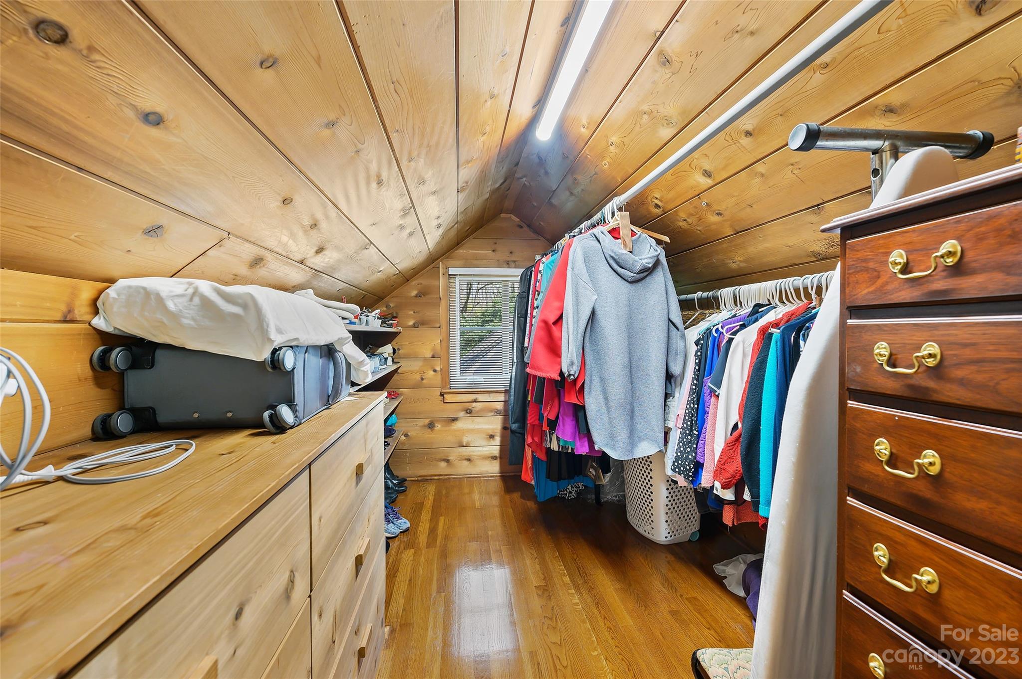 246 Shasta Lane Charlotte, NC 28211 - Photo 28 of 48 a view of walk in closet with clothes and shoes