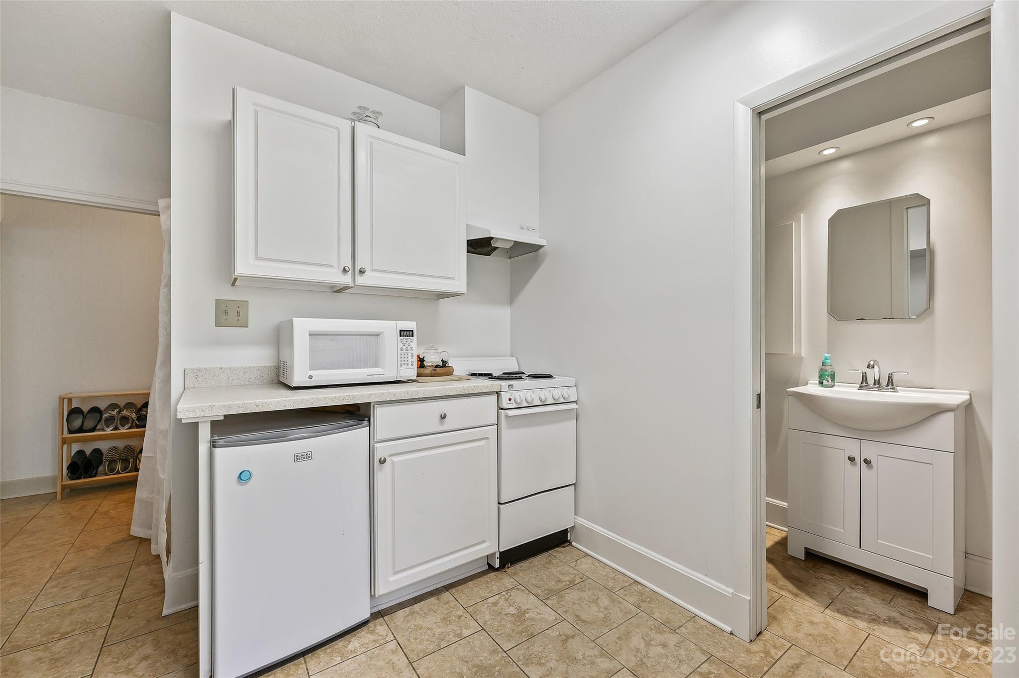 246 Shasta Lane Charlotte, NC 28211 - Photo 35 of 48 a bathroom with a sink and a mirror