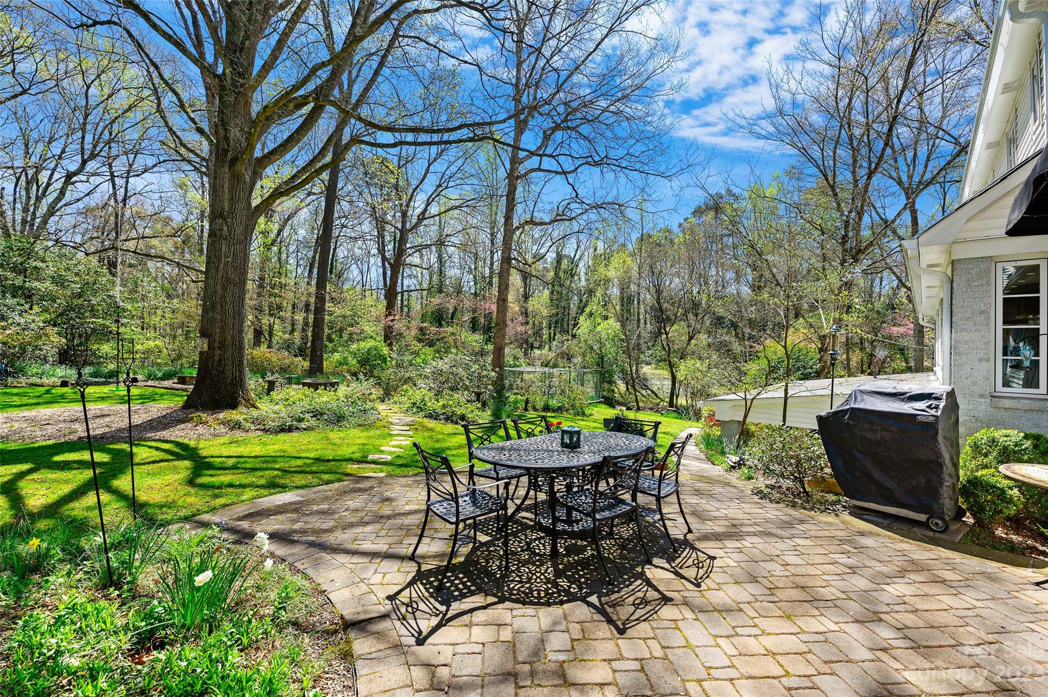 246 Shasta Lane Charlotte, NC 28211 - Photo 38 of 48 a patio with garden and outdoor seating