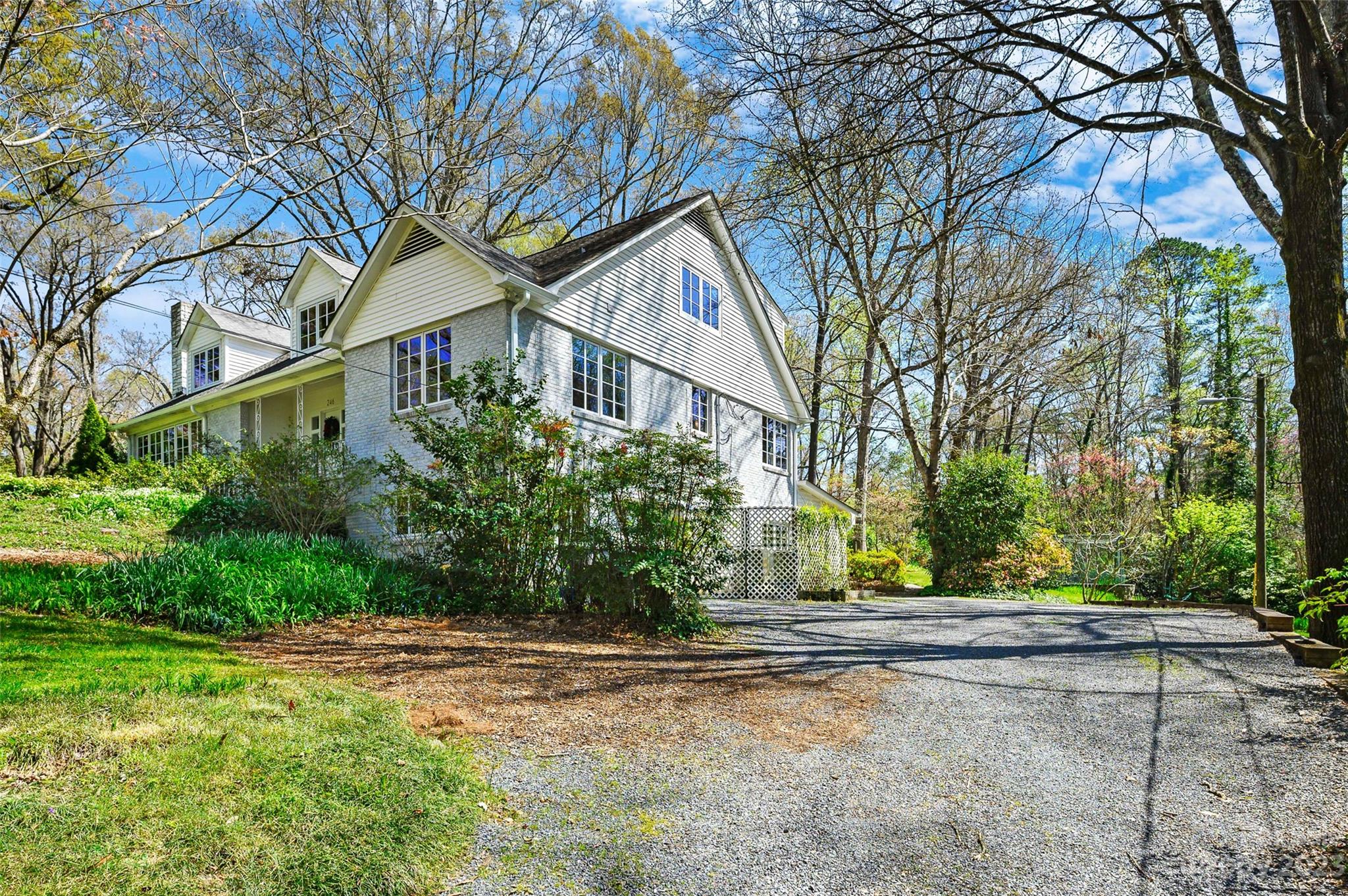 246 Shasta Lane Charlotte, NC 28211 - Photo 41 of 48 a front view of house with yard and trees around