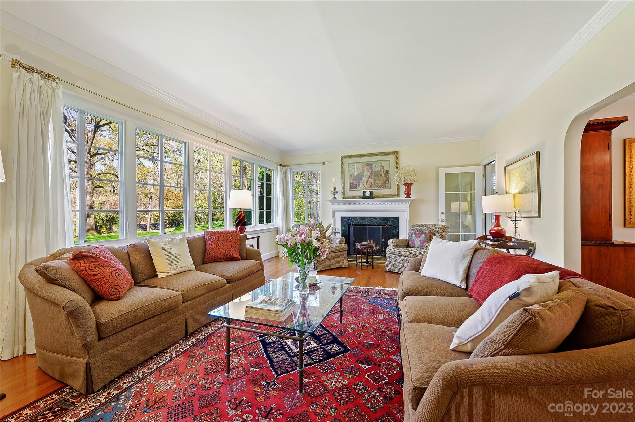 246 Shasta Lane Charlotte, NC 28211 - Photo 5 of 48 a living room with furniture fireplace and a large window