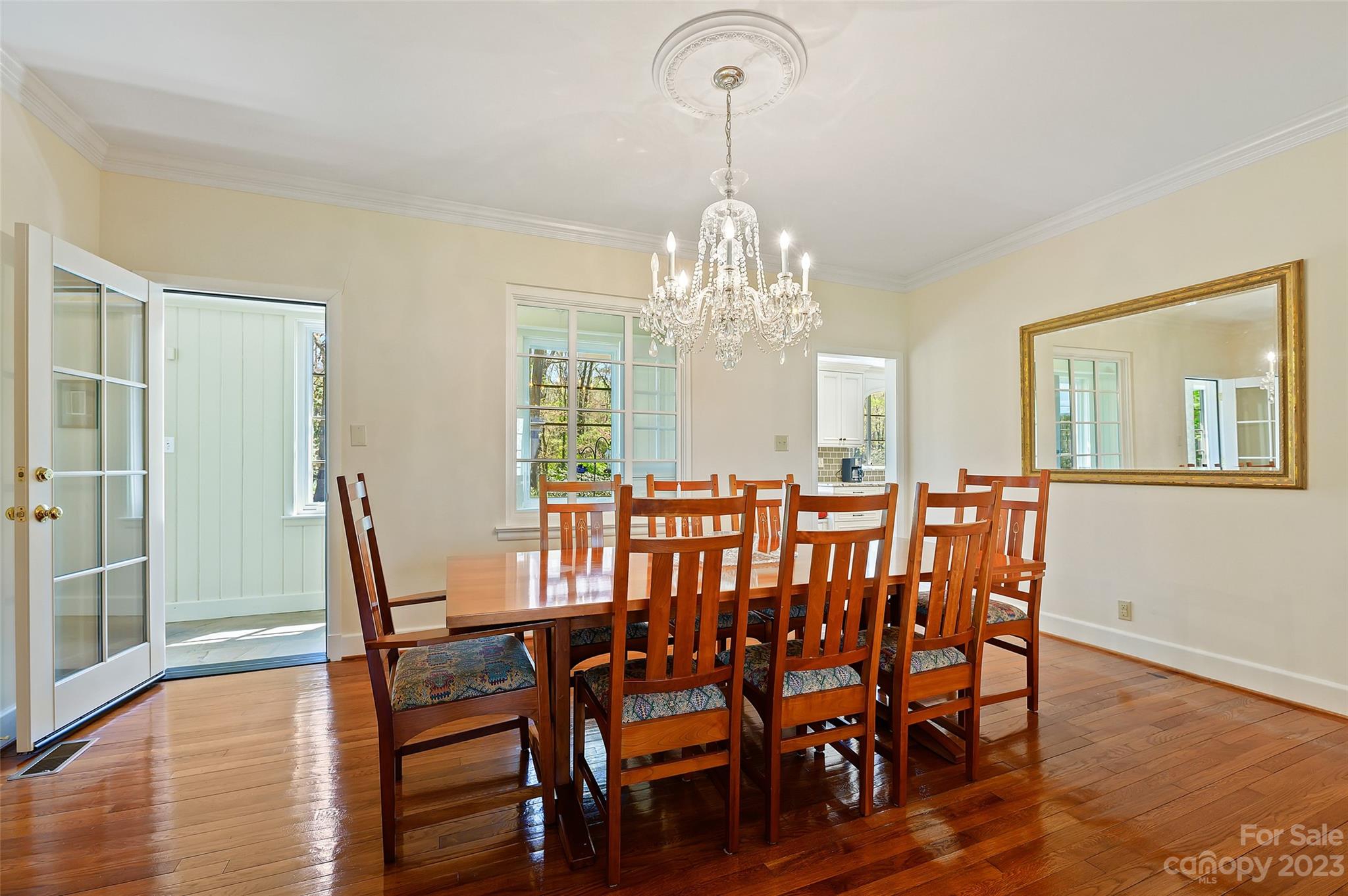 246 Shasta Lane Charlotte, NC 28211 - Photo 8 of 48 a view of a dining room with furniture wooden floor and chandelier