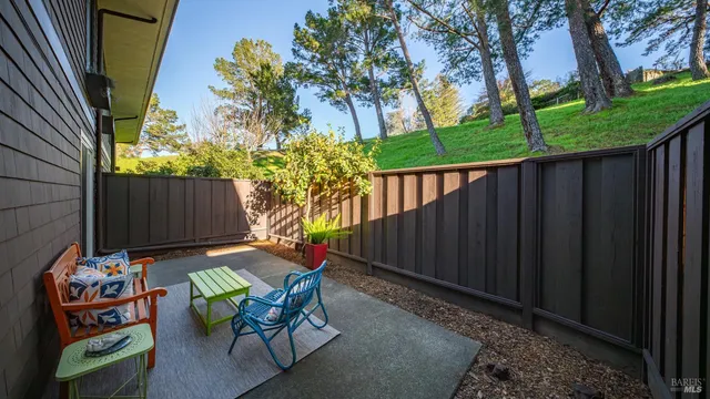 a backyard of a house with lots of green space