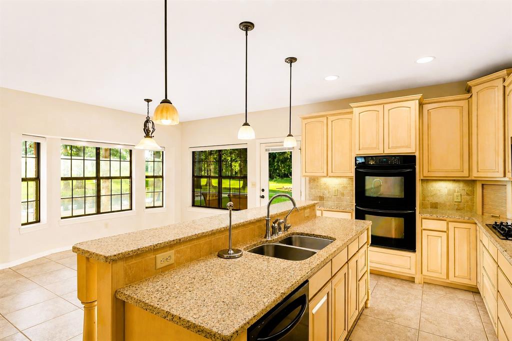 4940 North Frontage Road Winfield, TX 75455 - Photo 22 of 40 Breakfast, Lunch & Dinner Time Doesn't Get Any Better with the View of the Pool & Majestic East Texas Trees!