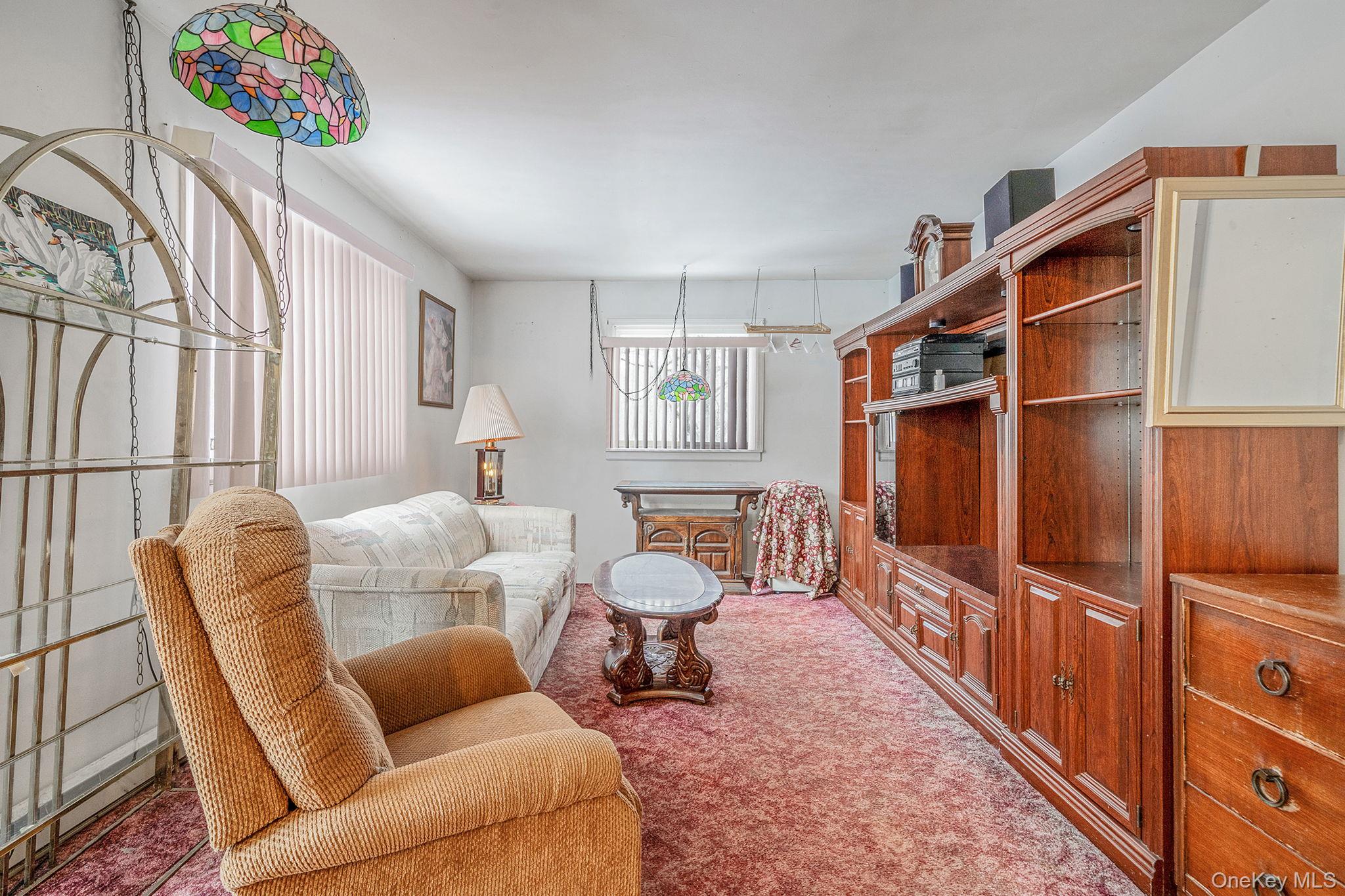 244 Lakeside Trail Ridge, NY 11961 - Photo 15 of 36 Sitting room featuring light carpet