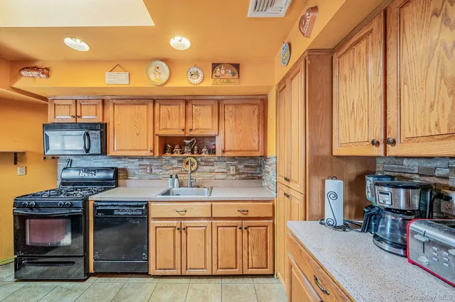 $649,999 | 244 Lakeside Trail, Ridge, NY 11961