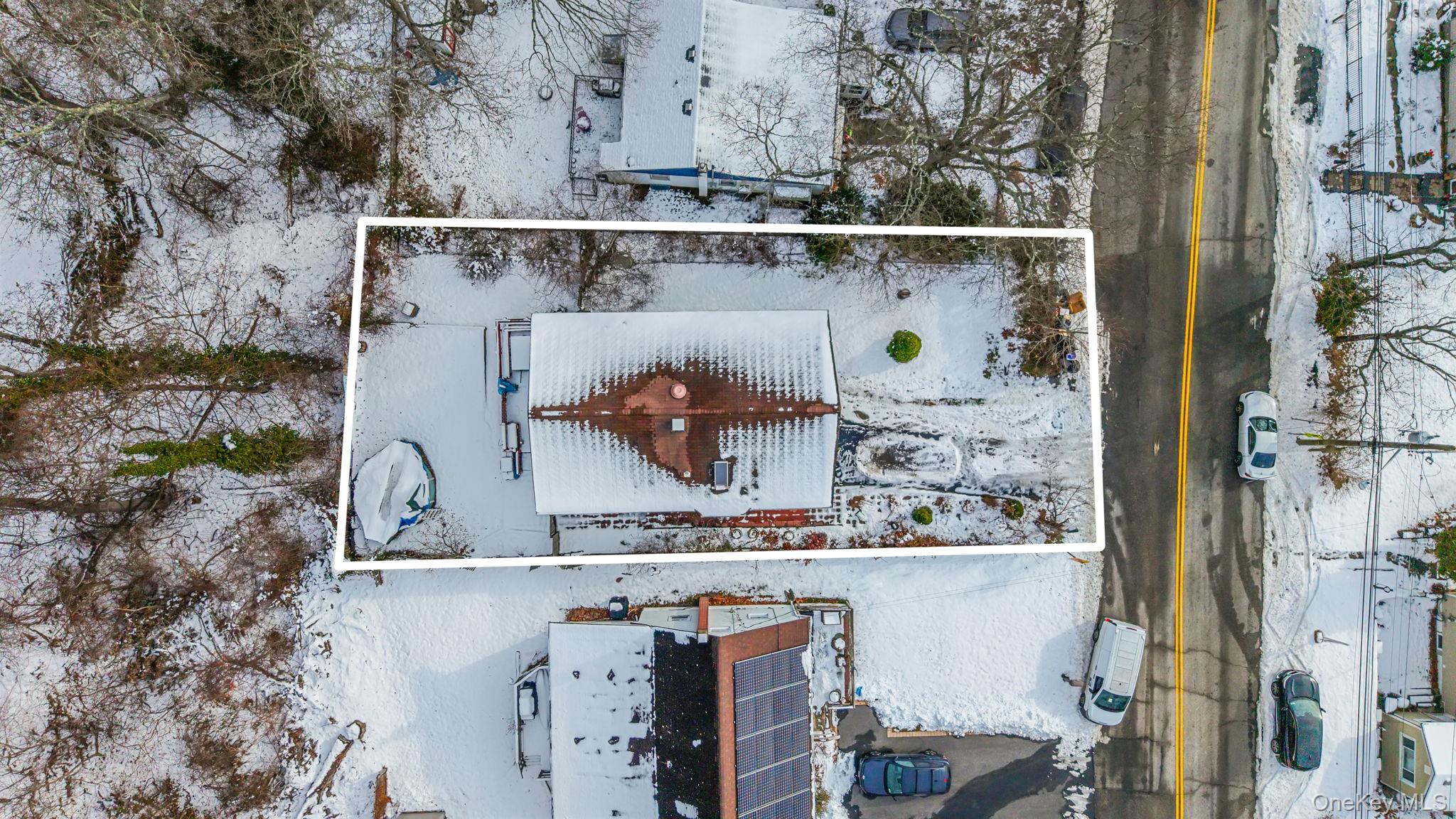 244 Lakeside Trail Ridge, NY 11961 - Photo 4 of 36 Snowy aerial view with property parcel outlined