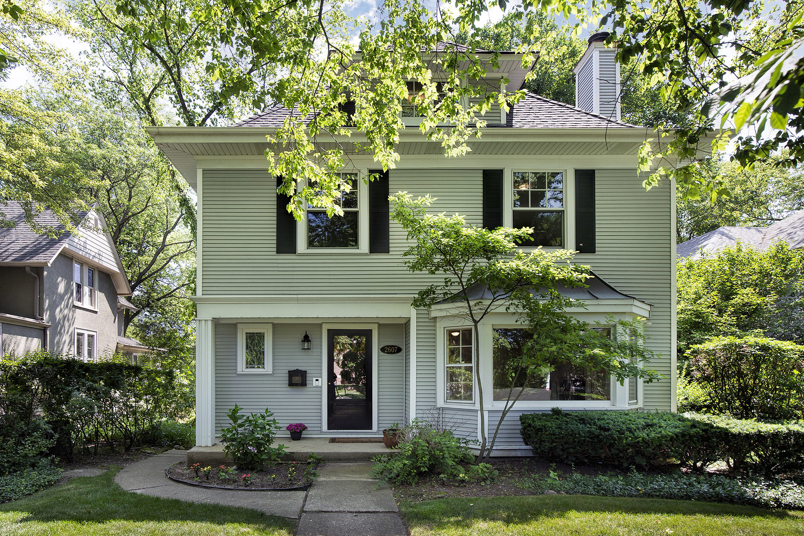 2607 Ridge Avenue Evanston, IL 60201 - Photo 2 of 22 front view of a house with a yard