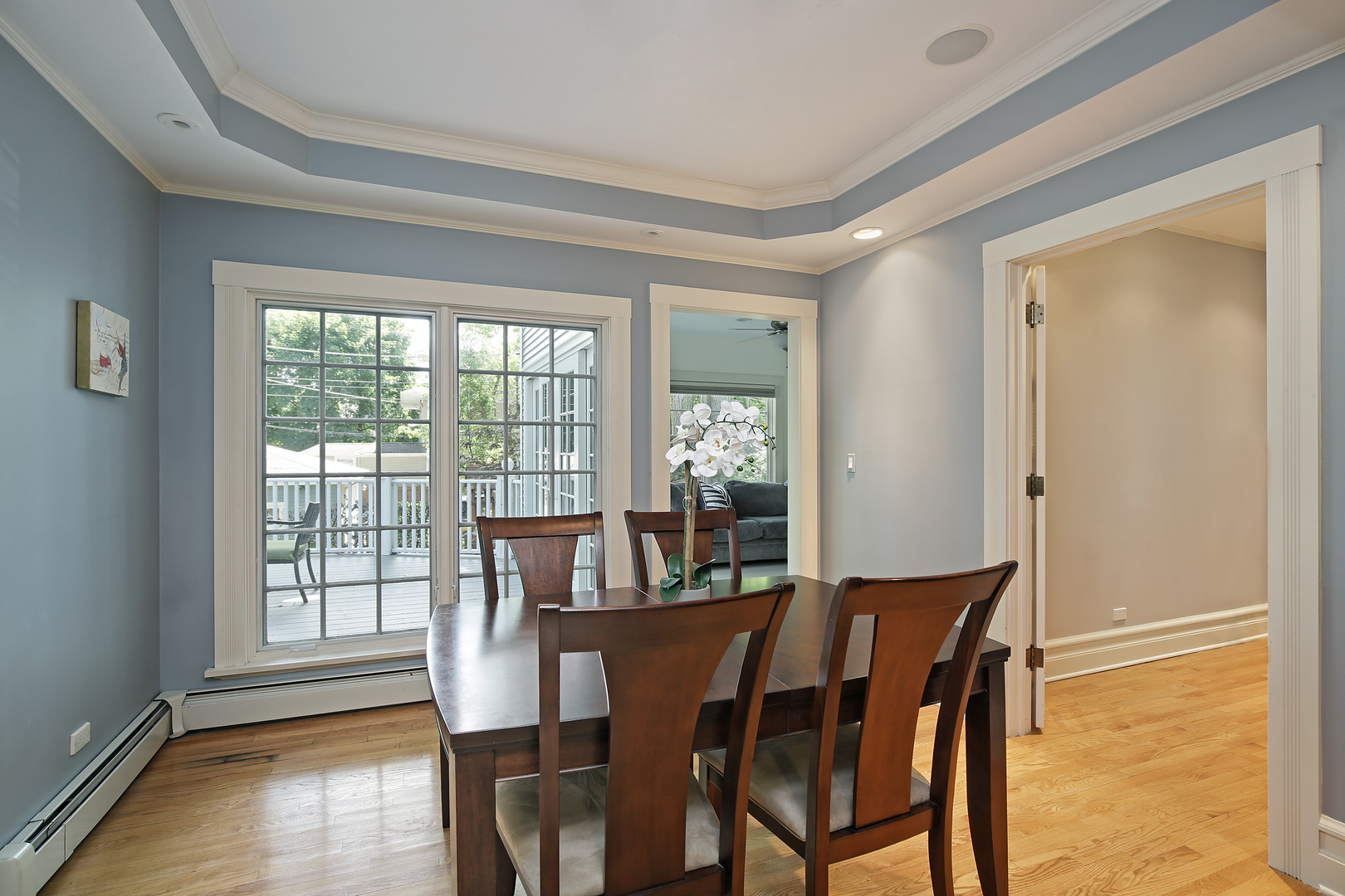 2607 Ridge Avenue Evanston, IL 60201 - Photo 5 of 22 a view of a dining room with furniture window and wooden floor