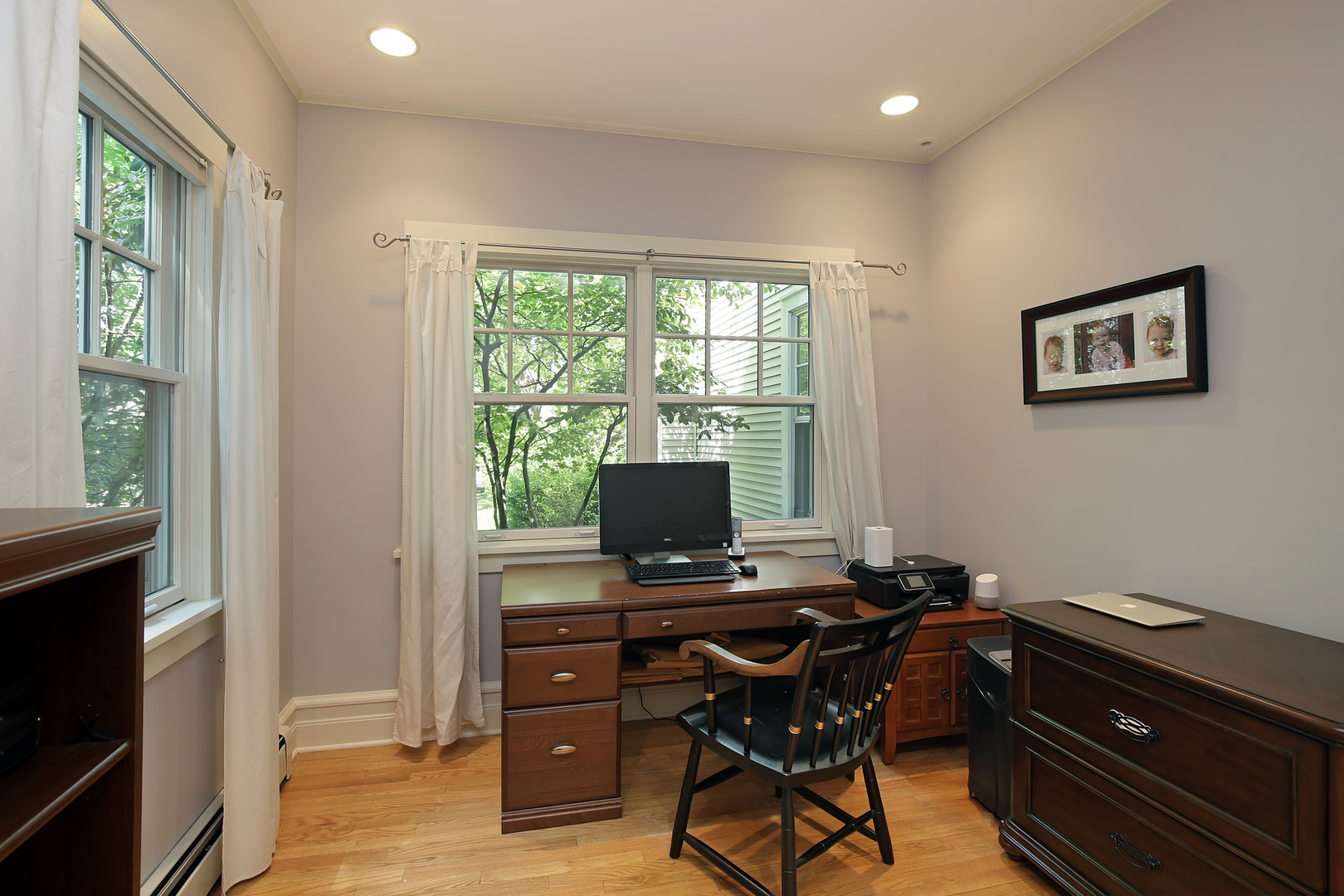 2607 Ridge Avenue Evanston, IL 60201 - Photo 8 of 22 a view of a workspace with furniture and a window