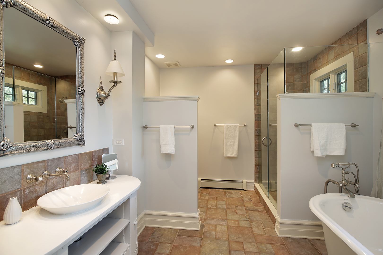 2607 Ridge Avenue Evanston, IL 60201 - Photo 10 of 22 a bathroom with a sink a toilet and shower