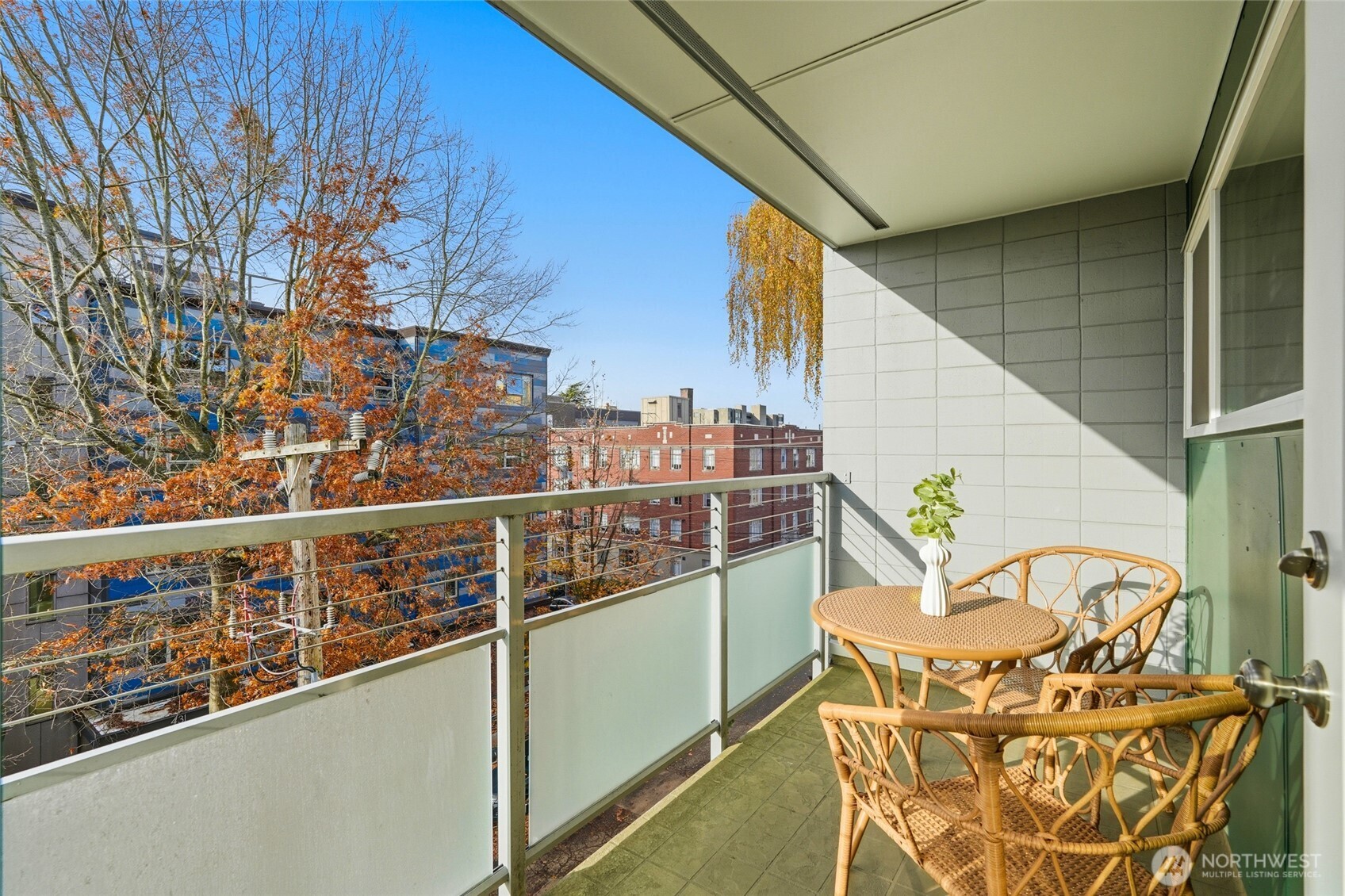 705 East Republican Street, Unit 403 Seattle, WA 98102 - Photo 15 of 28 a view of a balcony with chairs