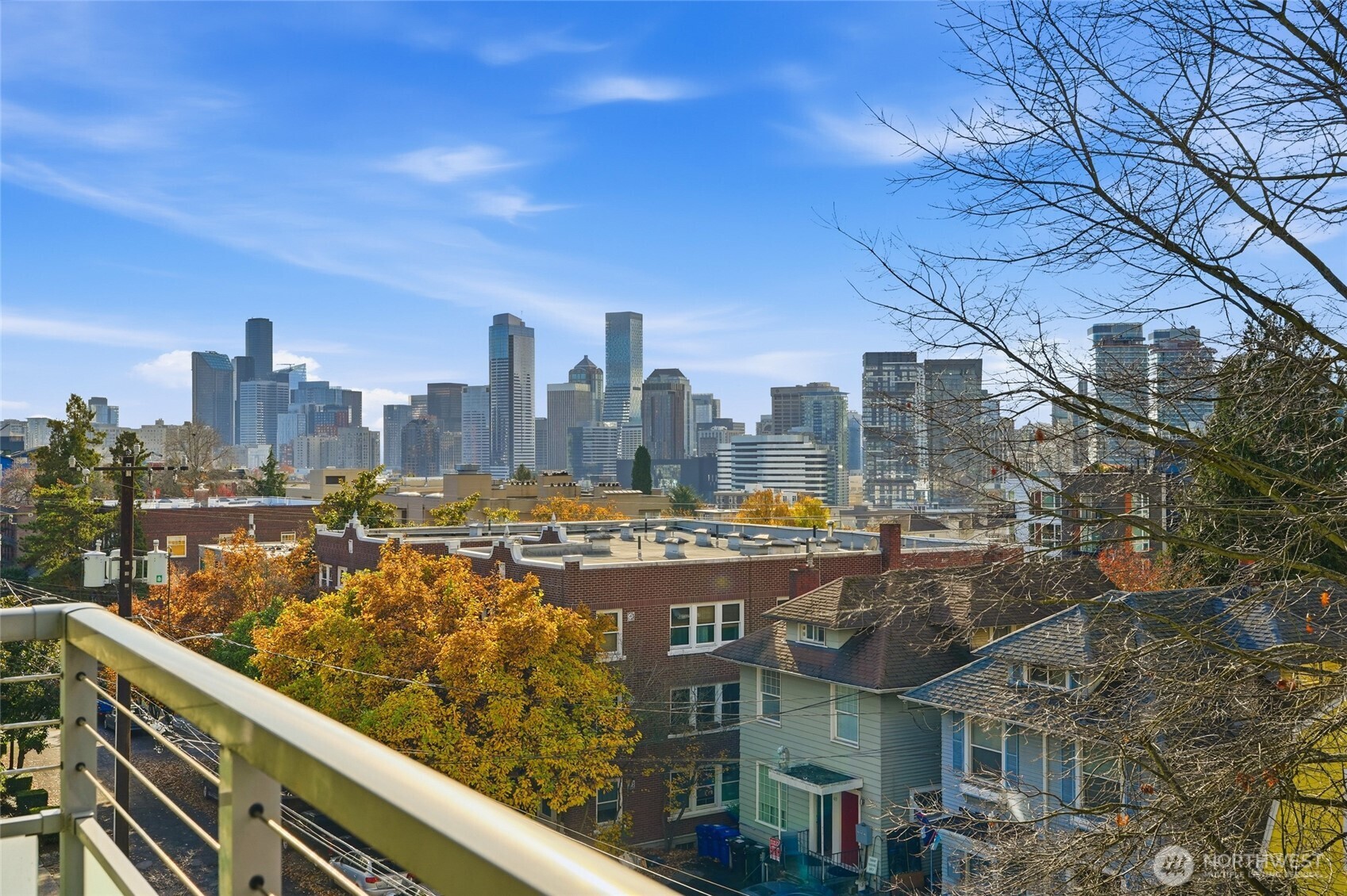 705 East Republican Street, Unit 403 Seattle, WA 98102 - Photo 16 of 28 a city view with tall buildings
