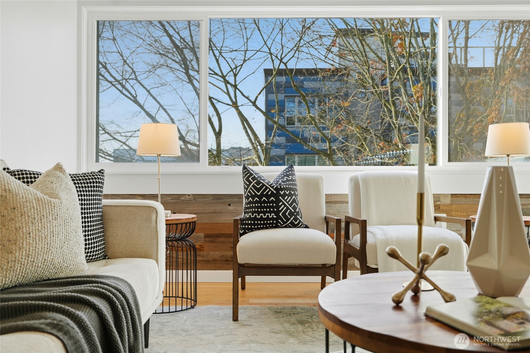 705 East Republican Street, Unit 403 Seattle, WA 98102 - Photo 4 of 28 a balcony with table and chairs