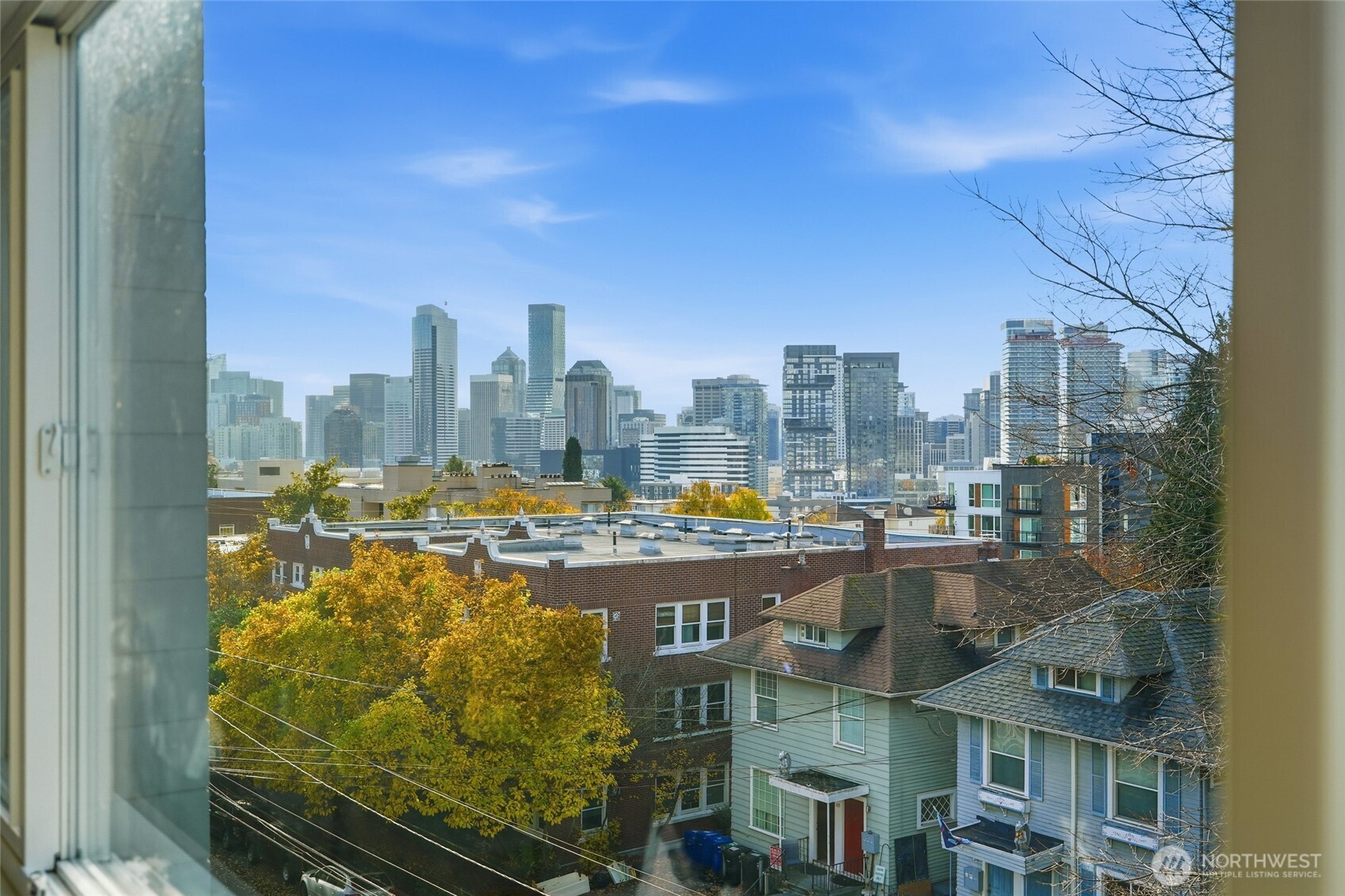 705 East Republican Street, Unit 403 Seattle, WA 98102 - Photo 6 of 28 a view of a city with tall buildings