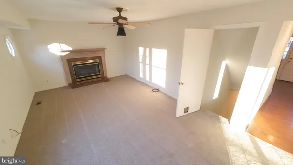 a view of a livingroom with a fireplace